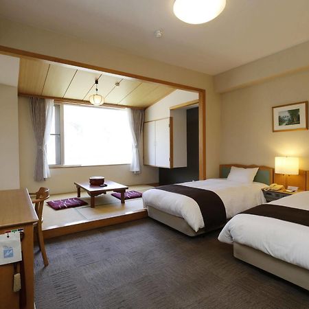 Yuyado Kuttari Onsen Lake Inn Shintoku Extérieur photo