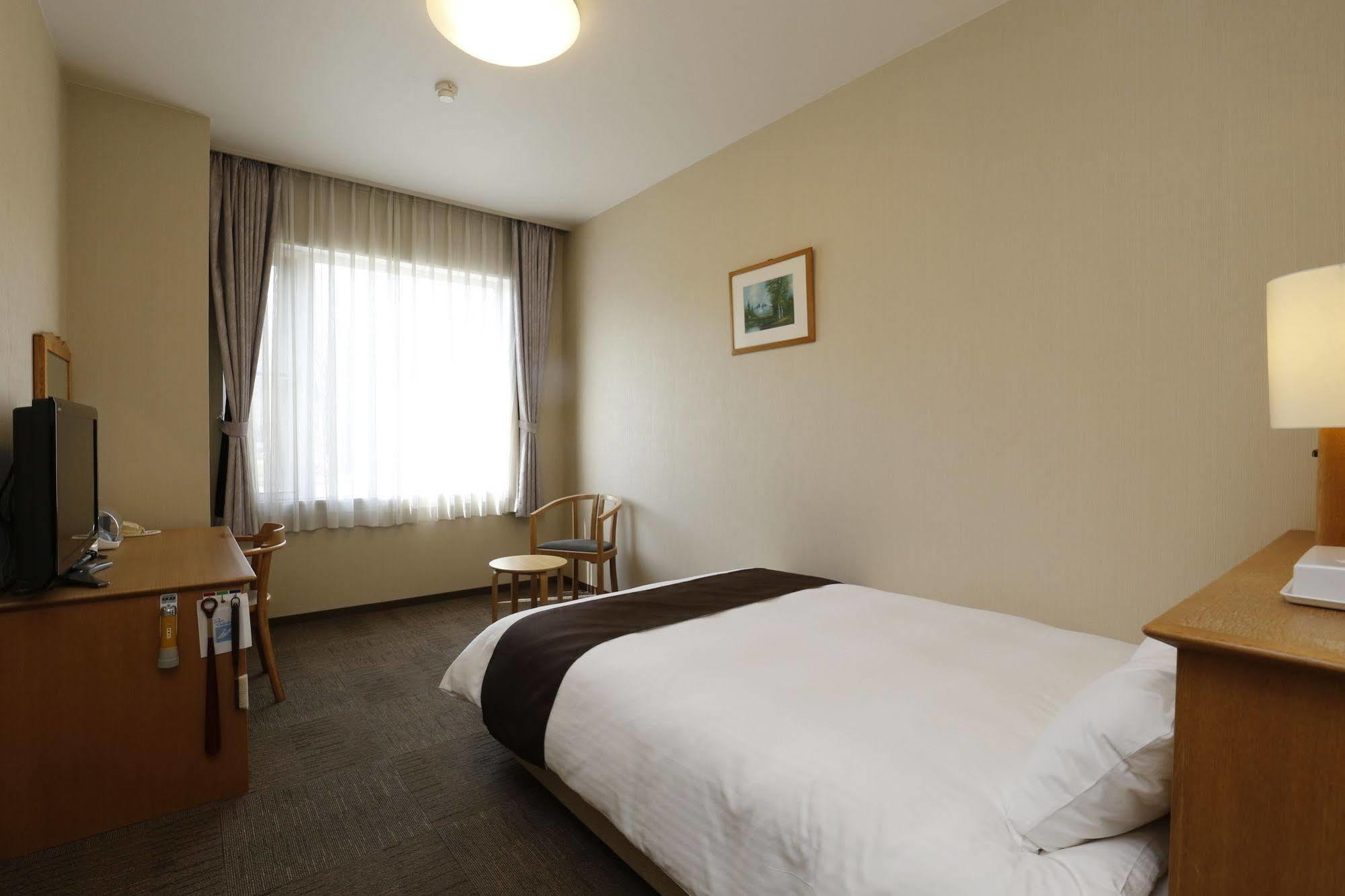 Yuyado Kuttari Onsen Lake Inn Shintoku Extérieur photo